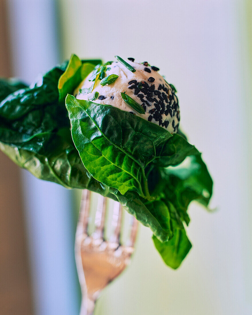 Spinach and goat cheese dumplings with black cumin