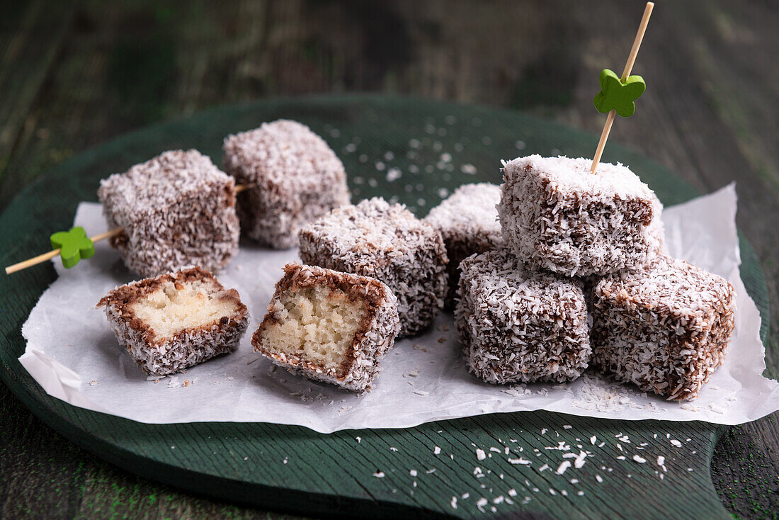 Vegan Cupavci - sponge cake cubes in a chocolate-coconut coating