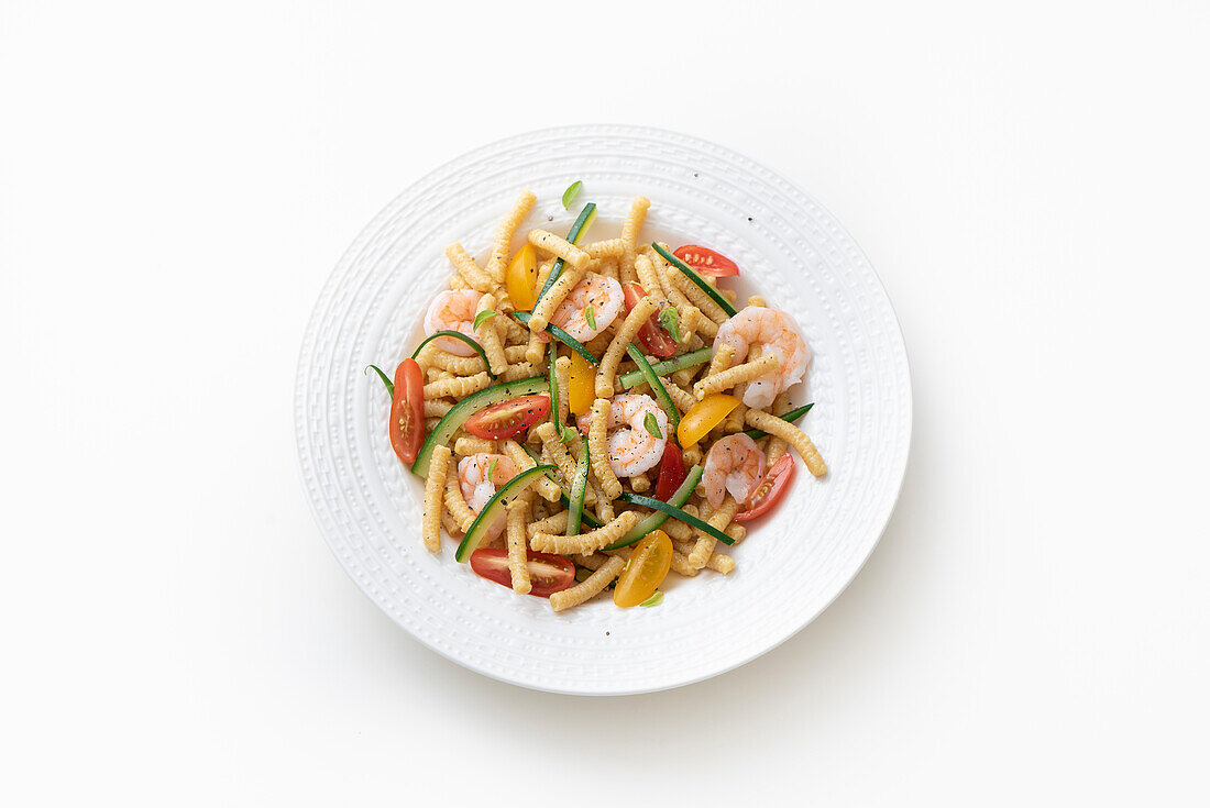 Sautéed passatelli with shrimp and vegetables