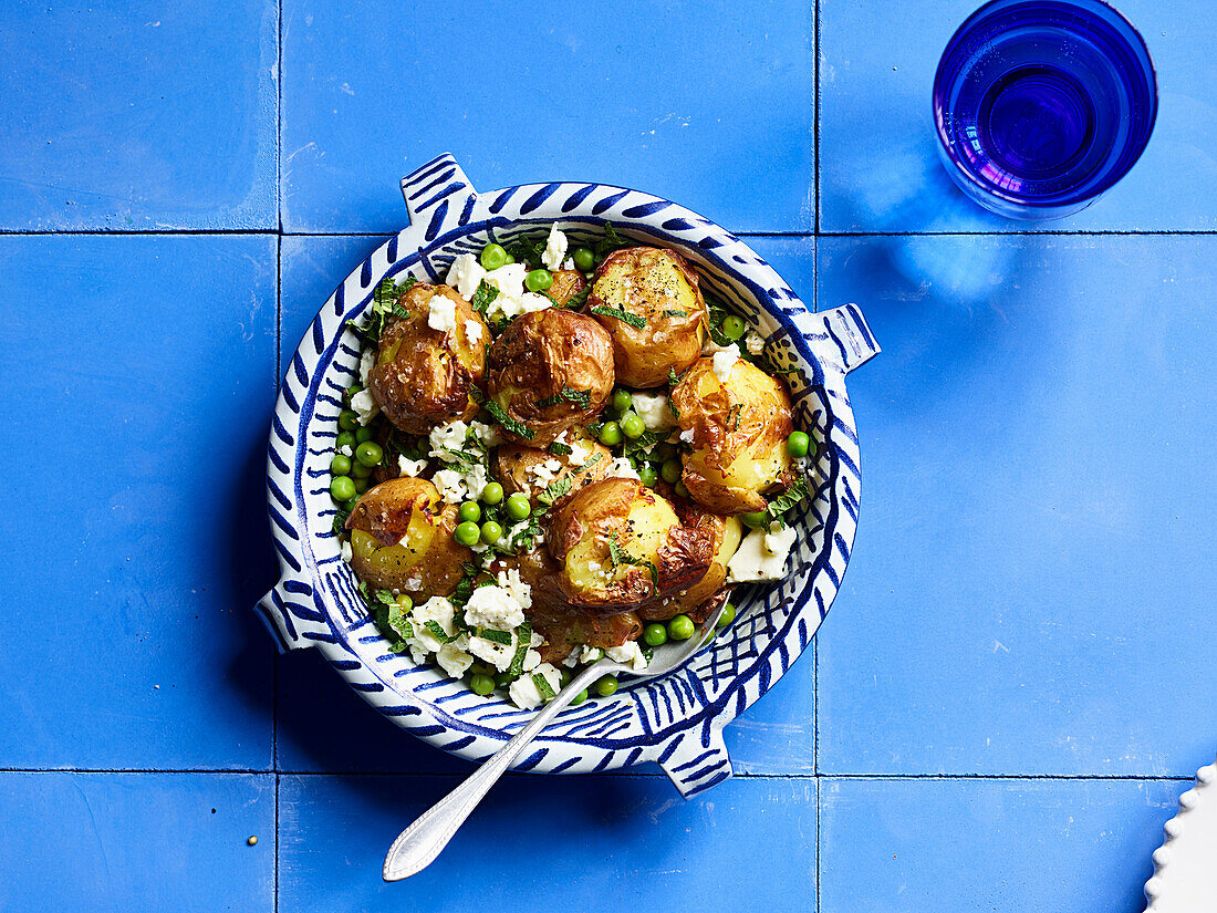 Smashed new potatoes with feta, mint and peas