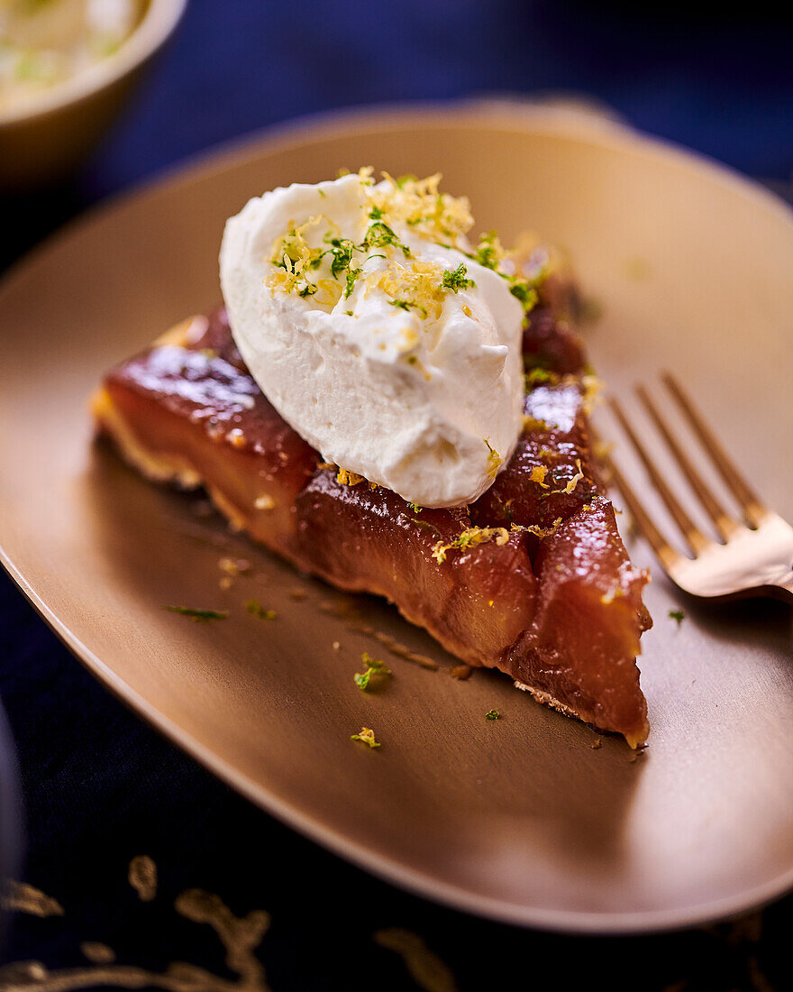 A piece of tarte tatin with cream