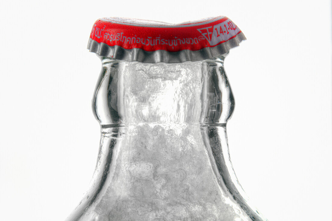 Bottle of frozen water with bottle cap