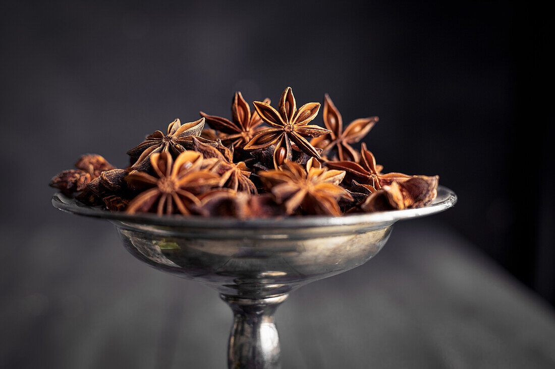 Star anise in a silver bowl