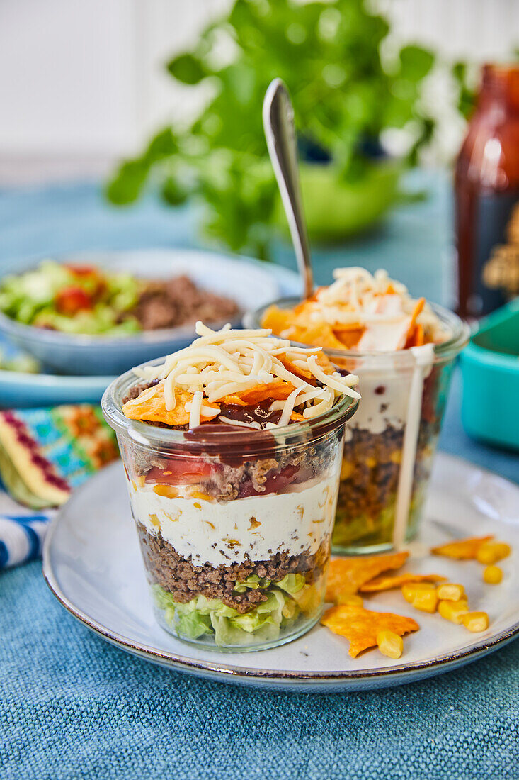 Layered Mexican salads in jars