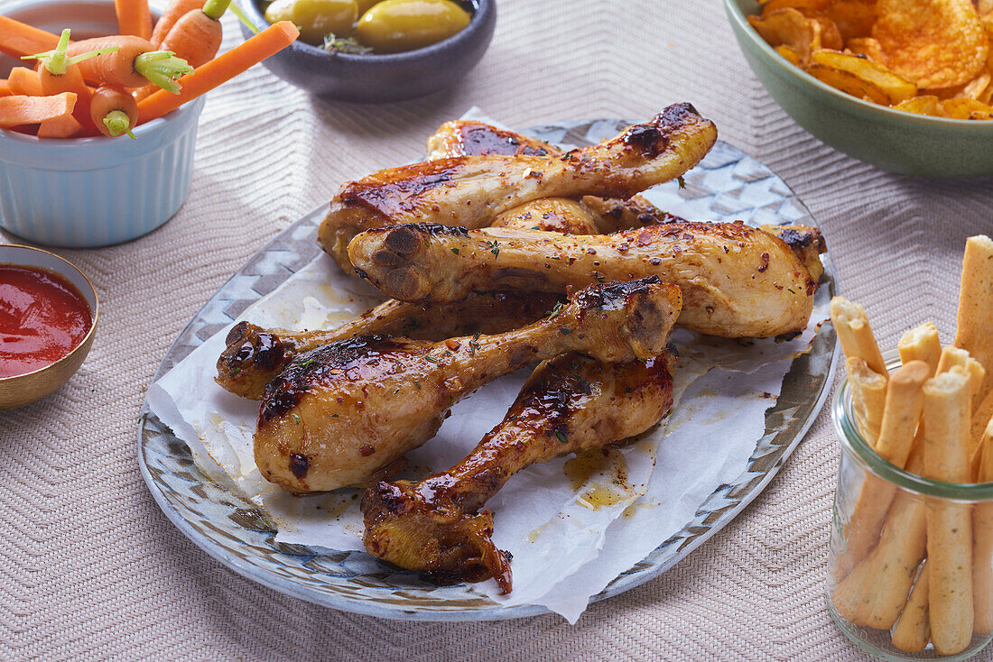 Roasted chicken legs for a barbecue