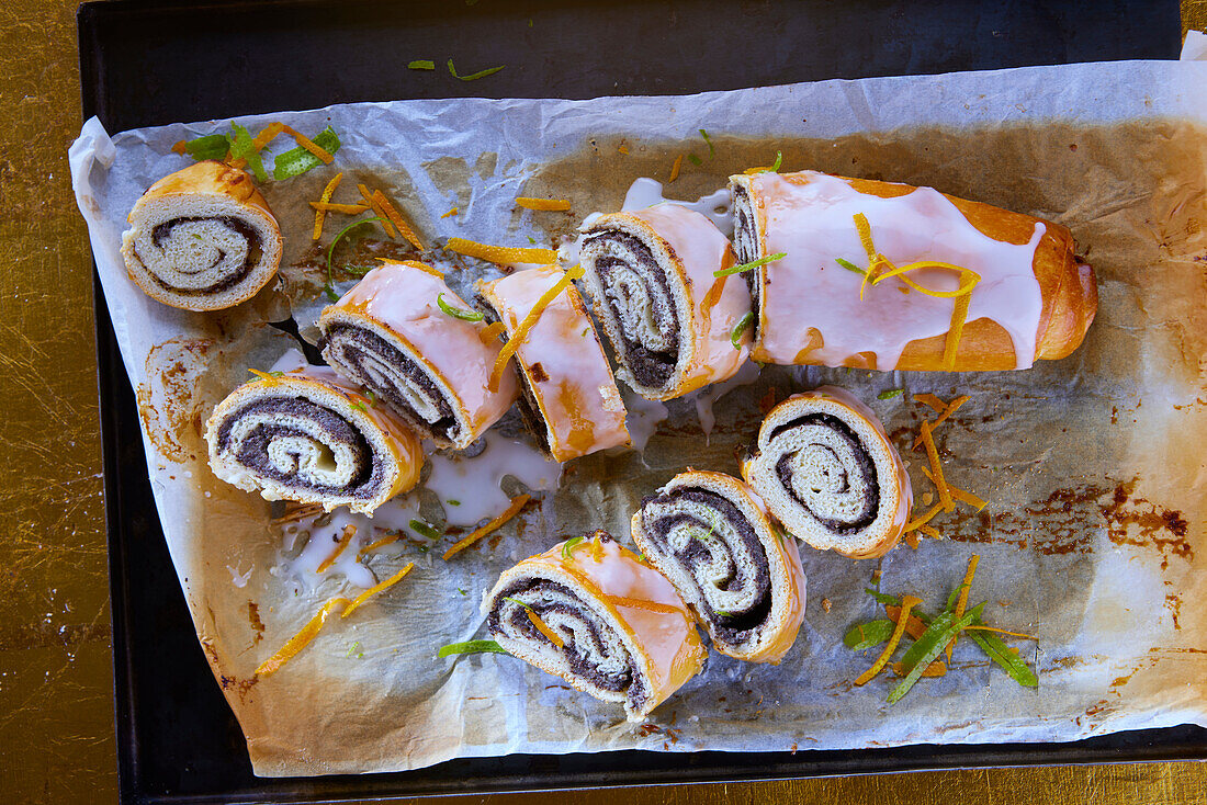 Poppy seed roll with glaze and orange zest