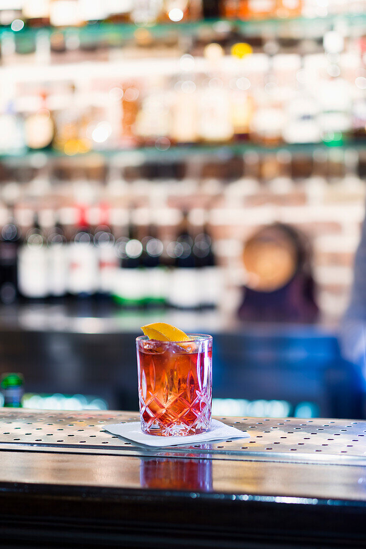 Cocktail in glass on bar counter