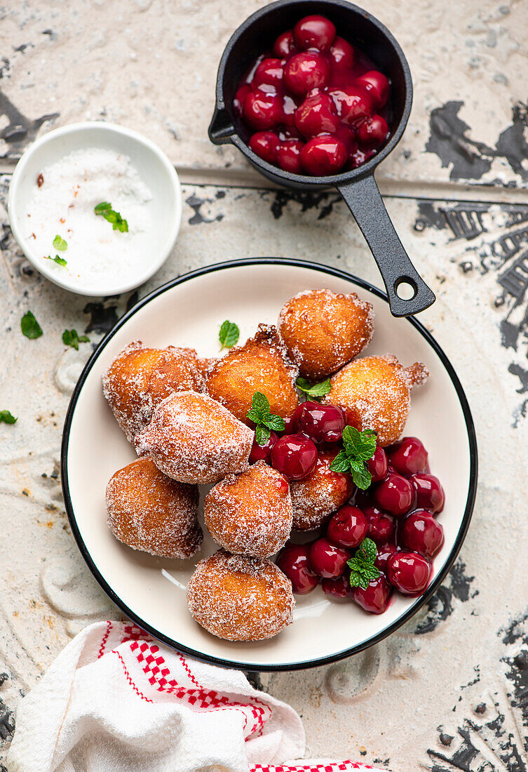 Buttermilk Donut holes with cherry compote