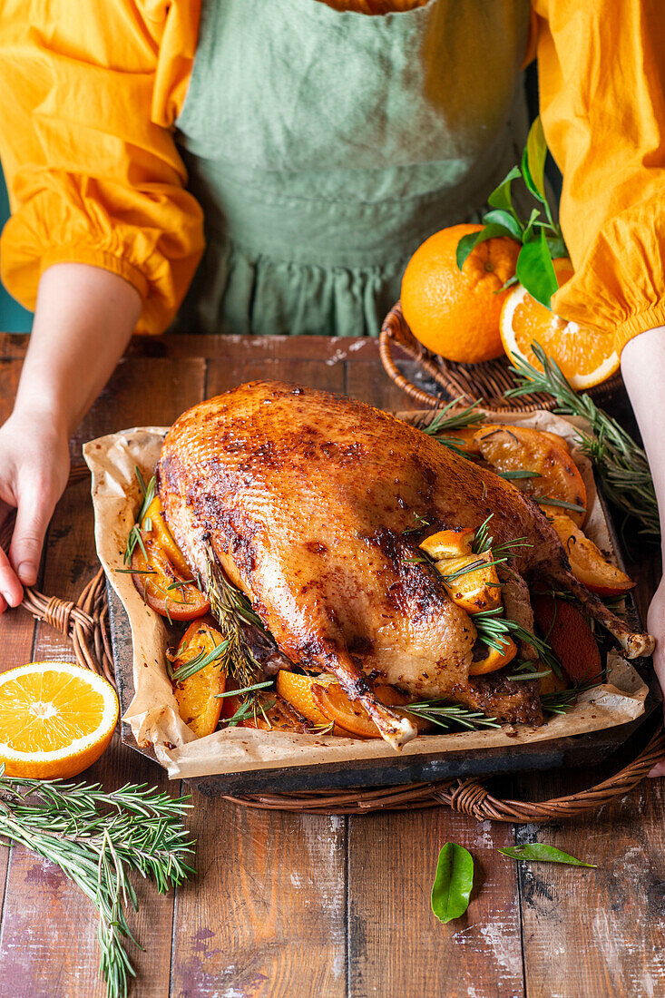 Roast goose with citrus fruits