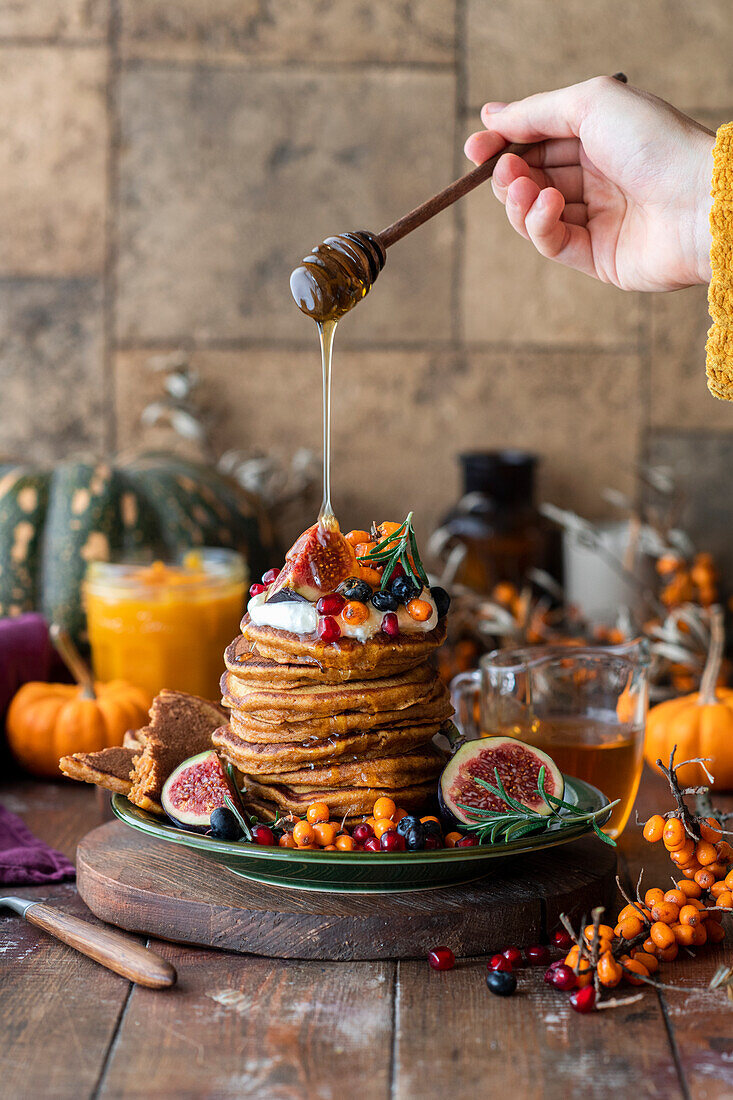 Pumpkin pancakes with autumn fruits