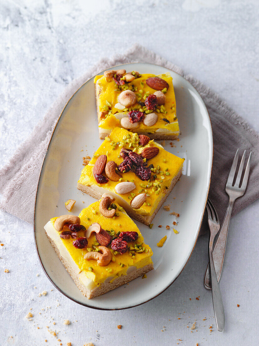 Autumn cake with pears, pumpkin puree, and nuts for Thanksgiving
