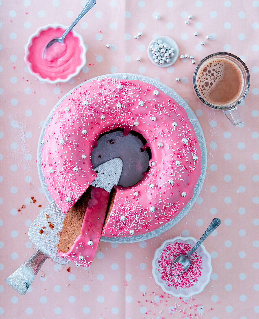 Donut cake with pink icing