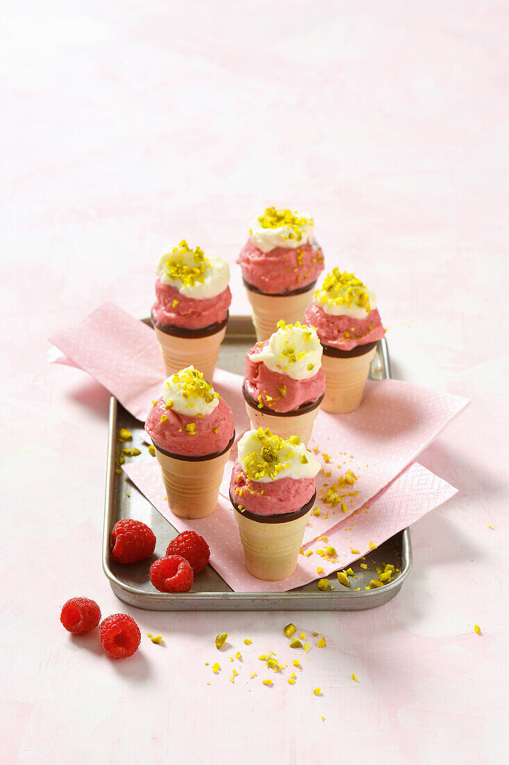 Raspberry ice cream in waffle cones