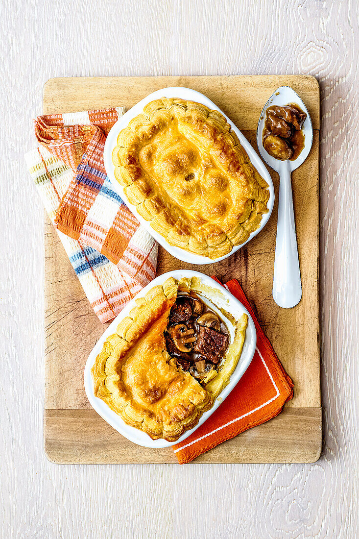 Savory steak and mushroom pies with puff pastry crust