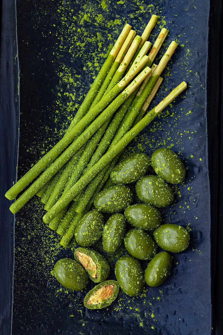 Japanese 'Pocky' and almonds in matcha chocolate