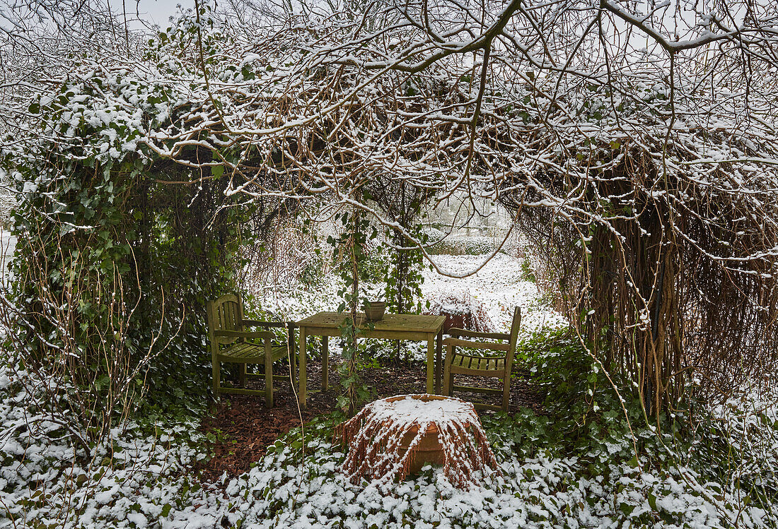 Snowy garden cave, Germany