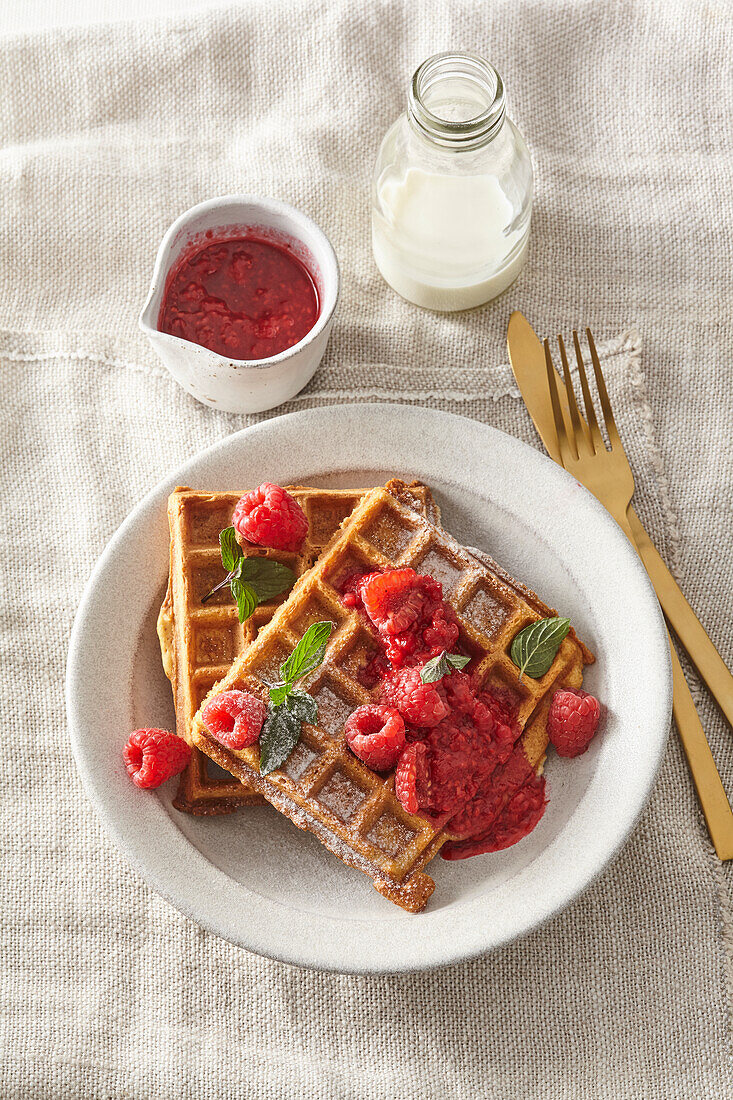 Coconut waffles with raspberry sauce