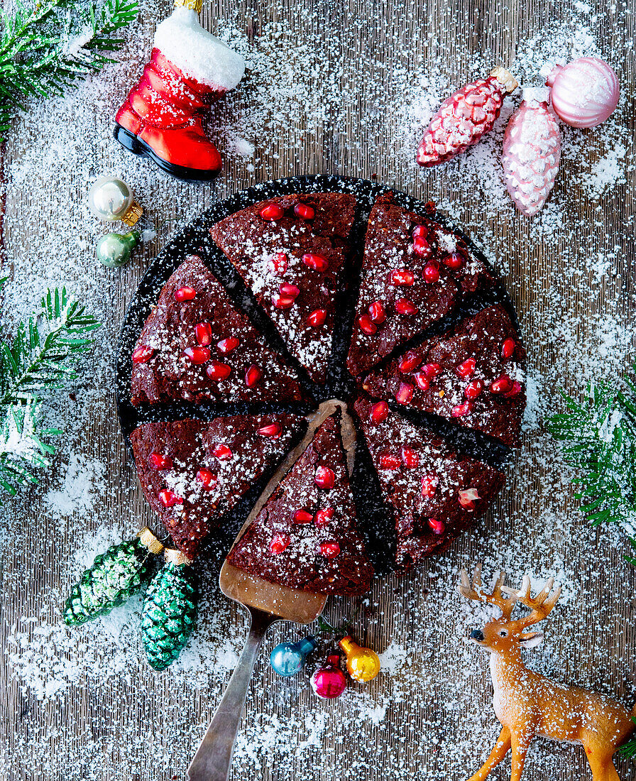 Christmas chocolate cake with pomegranate seeds