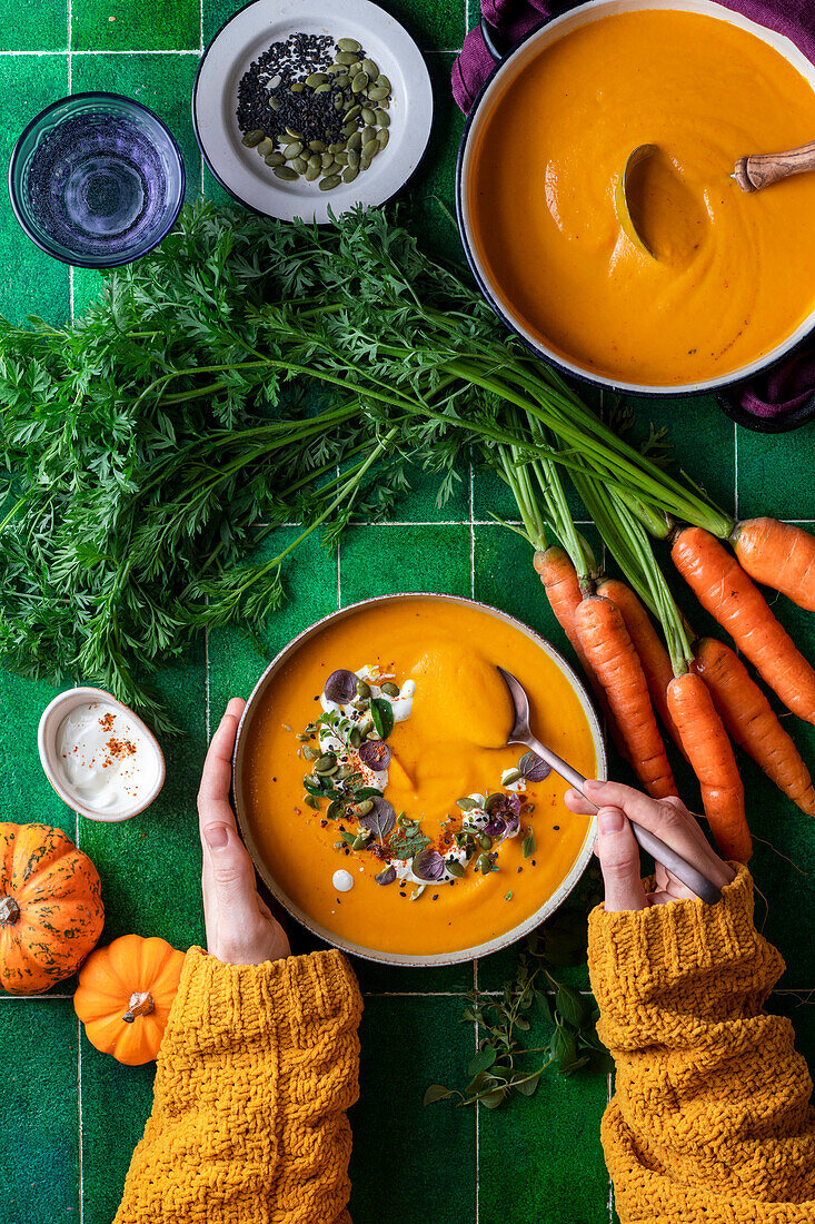 Pumpkin and carrot soup with topping