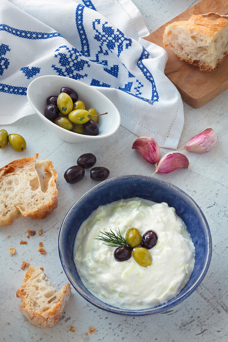 Tzatziki dip with olives