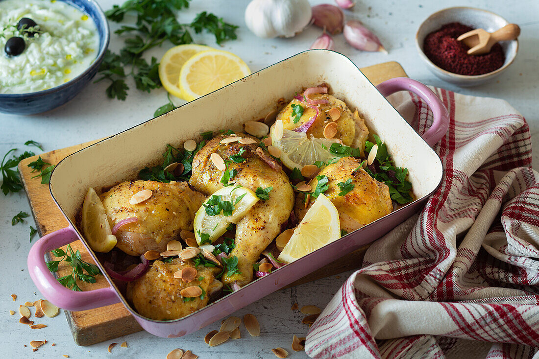 Marinated roasted chicken legs with lemon and almonds