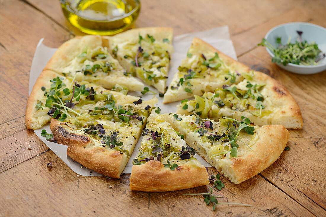 Spring pizza with sprouts