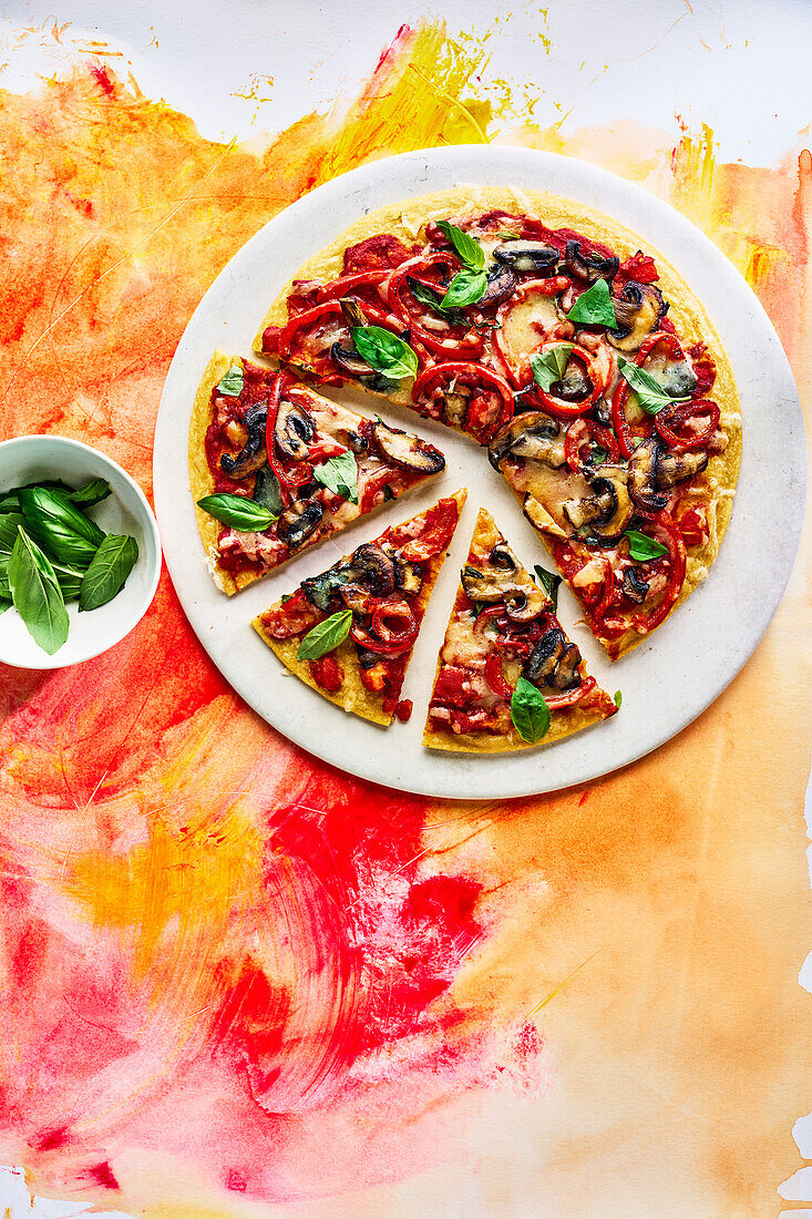 Chickpea pizza with peppers and mushrooms