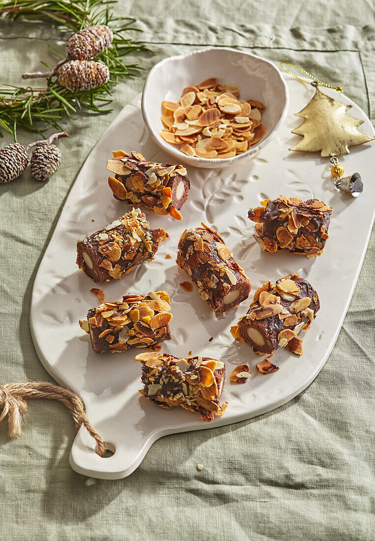 Walnut rolls with marzipan and almonds