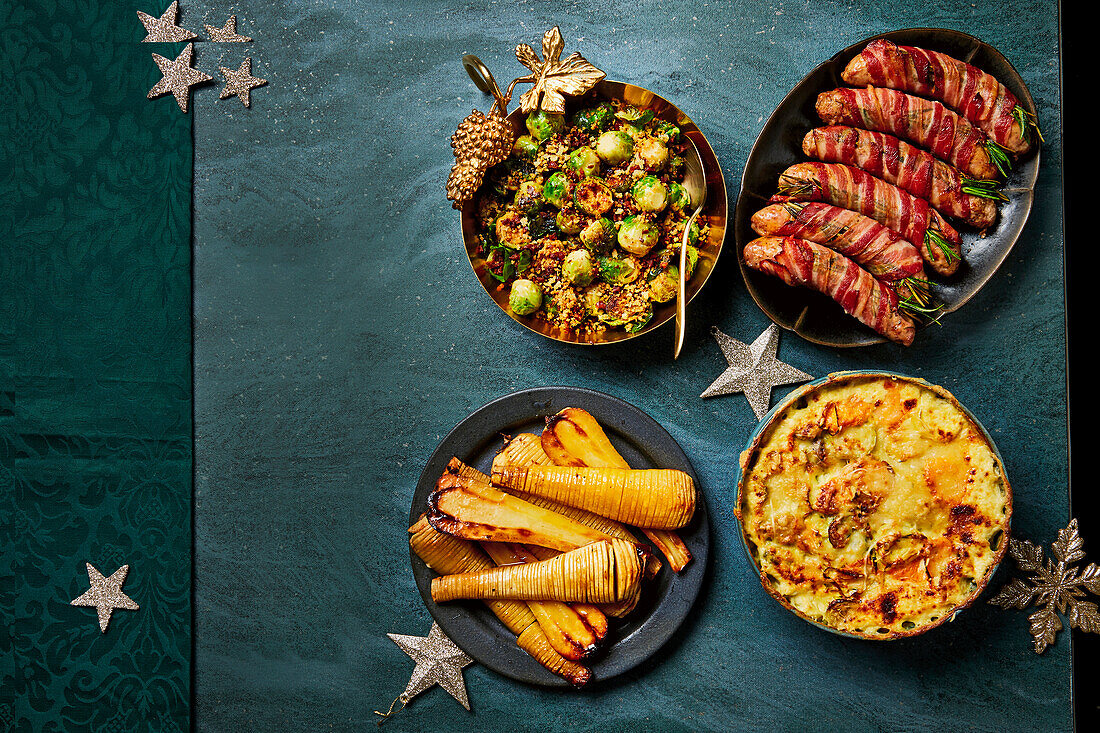 Roasted Brussels sprouts, jumbo pigs in blankets, Hasselback parsnips, vegetable gratin