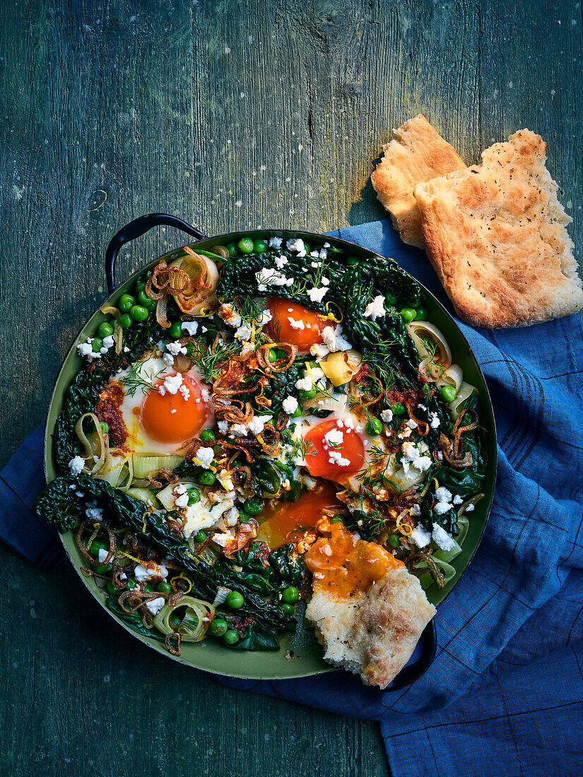 Green shakshuka with harissa and crispy shallots