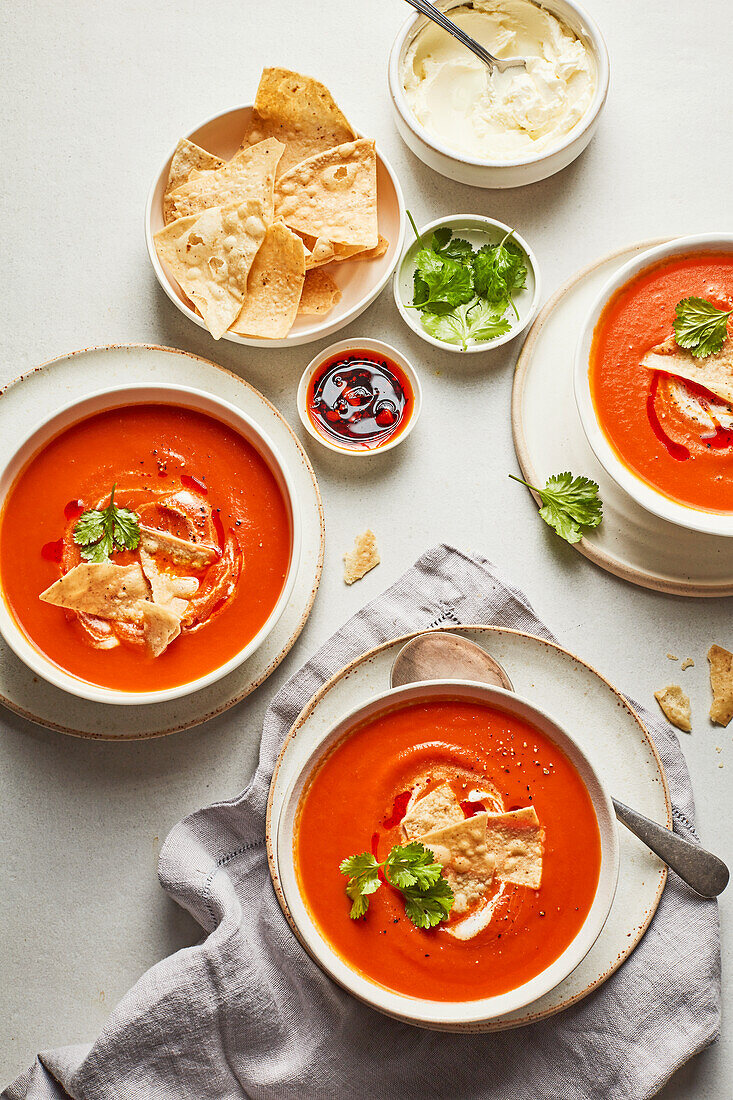Tomato soup with salsa and tortilla chips