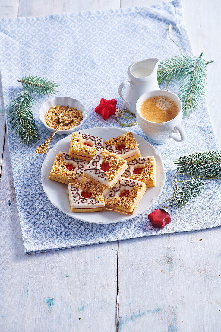 Decorated Linz cookies with redcurrant jam