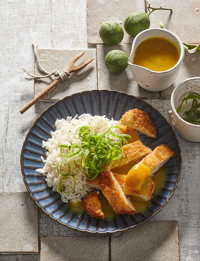 Katsu curry with breaded chicken and rice