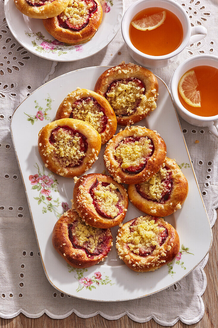 Round yeast pastry with plums