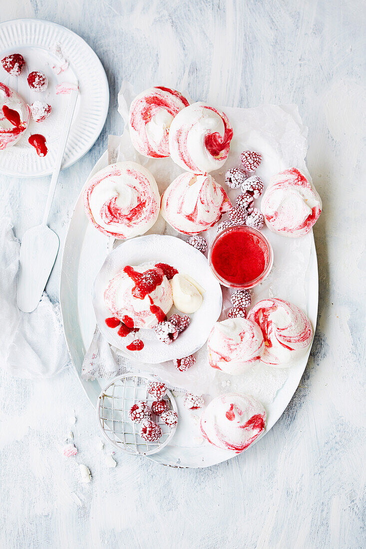 Rosewater and raspberry swirl meringues