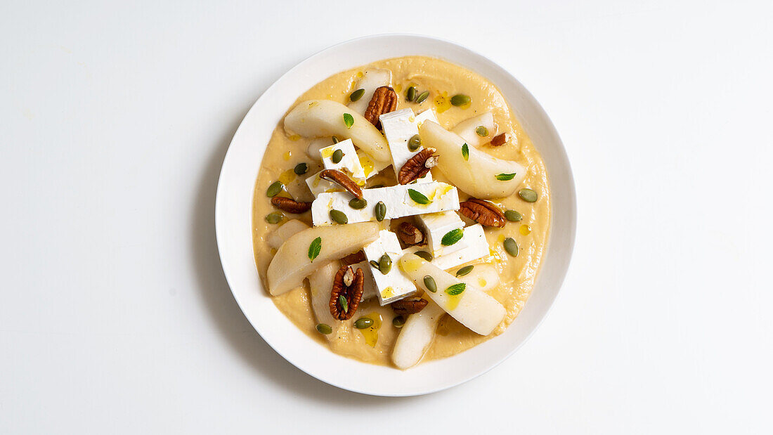 Chickpea hummus with pecans, pears and quartirolo cheese