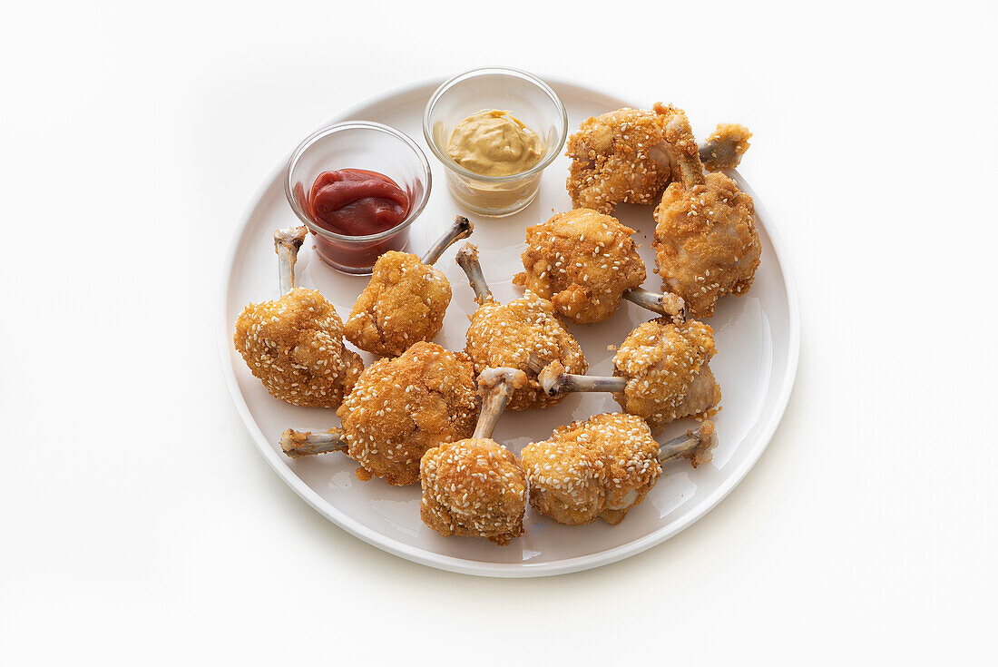 Frittierte Sesam-Chicken-Wing-Lollies