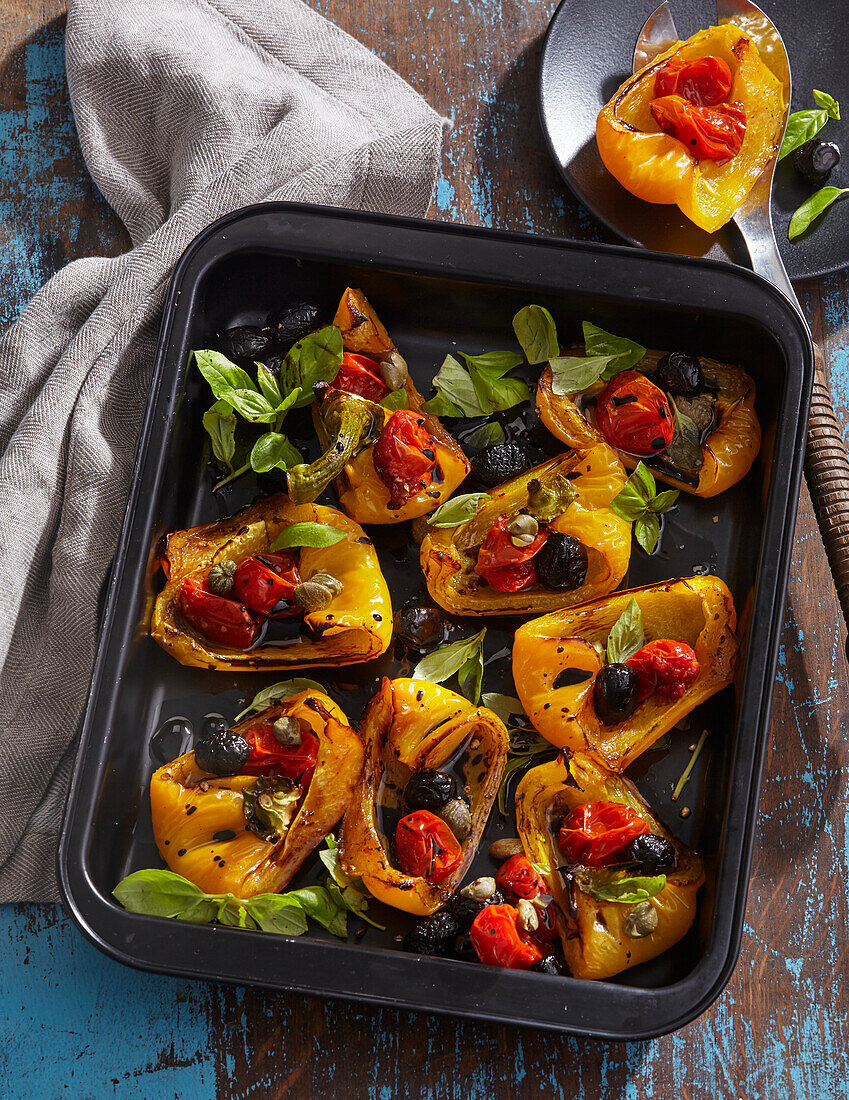 Grilled peppers with tomatoes and olives