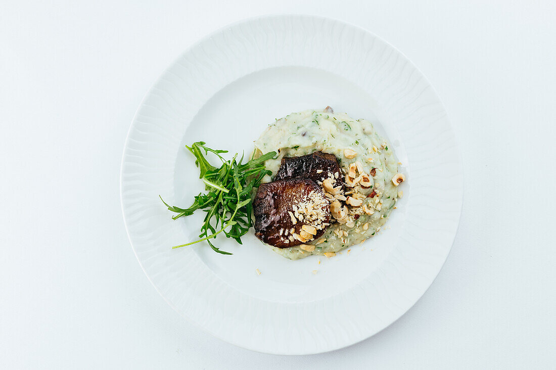 Fillet with nuts and herbed puree