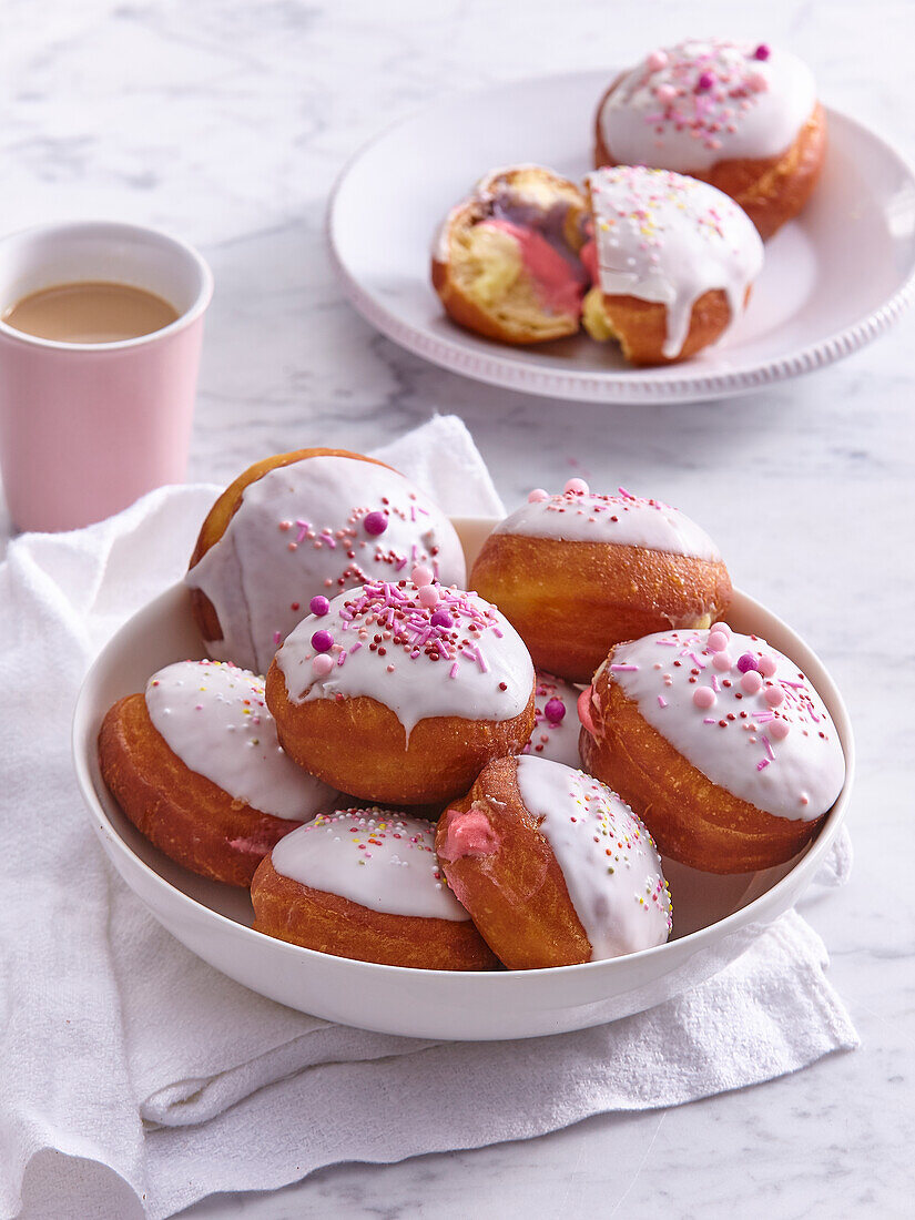 Donuts with custard filling and sugar icing