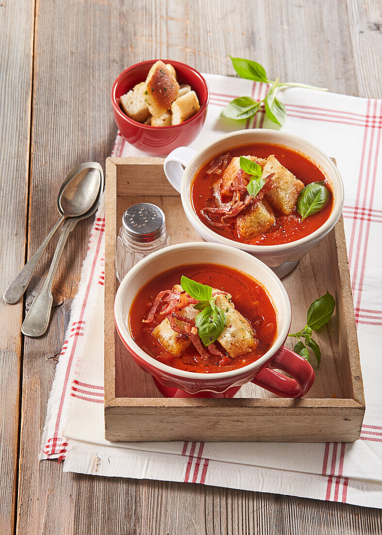 Tomato soup with bacon and croutons