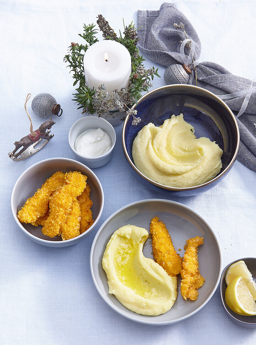 Breaded chicken strips with mashed potatoes