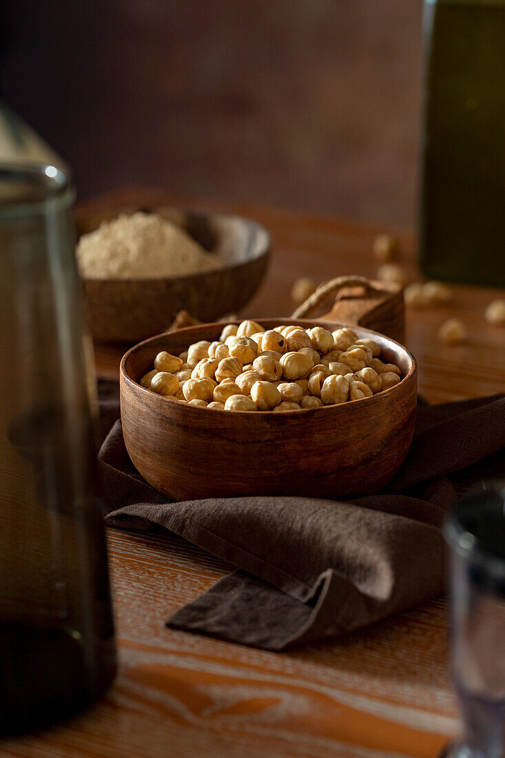 Wooden bowl with hazelnuts
