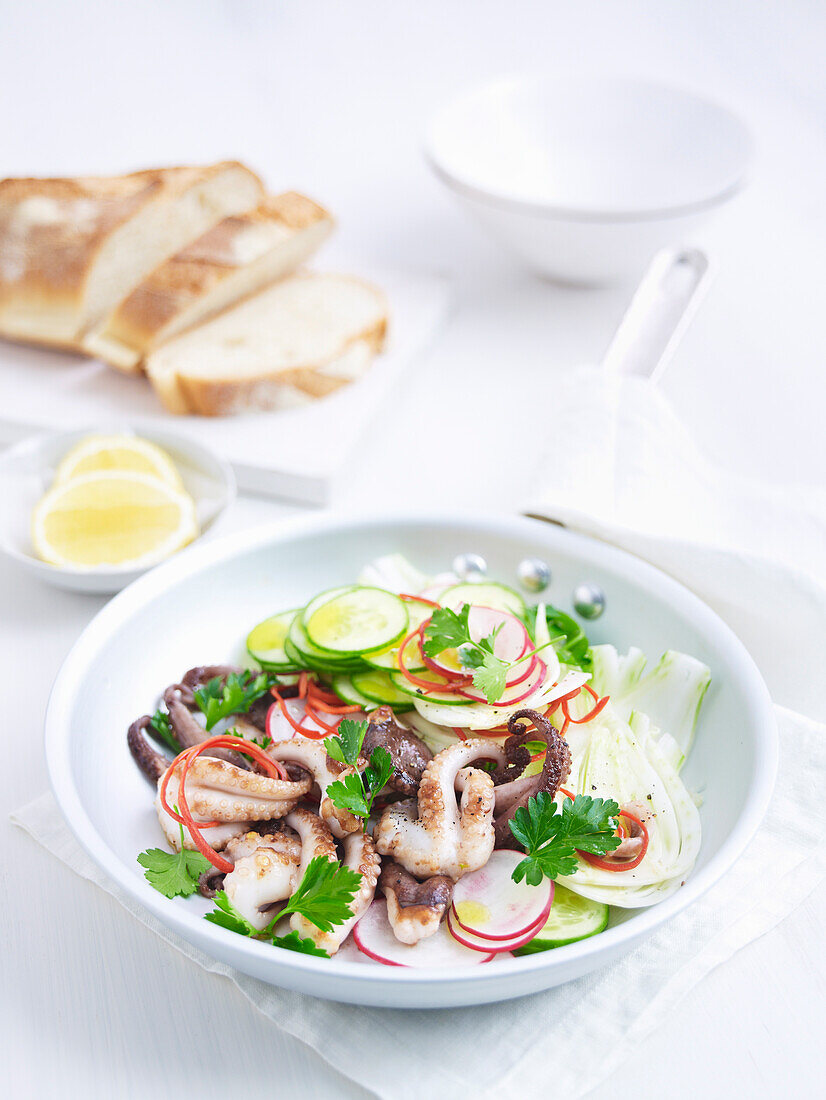 Warm baby octopus salad