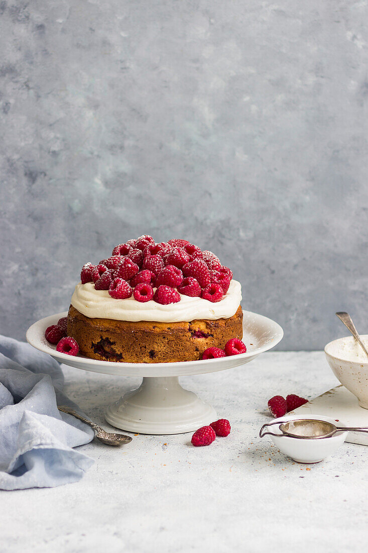 Raspberry cake with cream topping