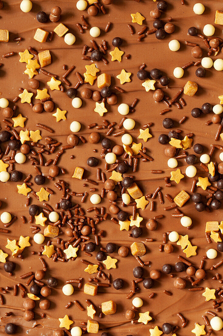 Milk chocolate with topping of mixed sprinkles