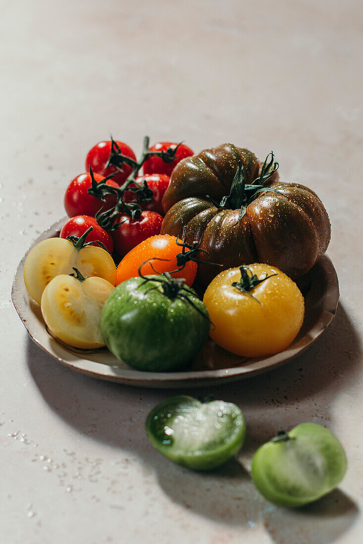 Assorted tomatoes on plate