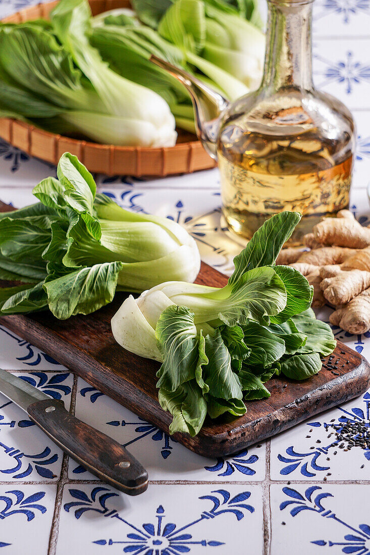 Fresh bok choy on chopping board