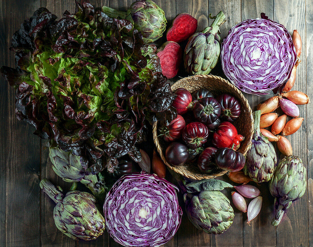 Purple vegetables (purple artichokes, tomatoes, onions, lettuce)