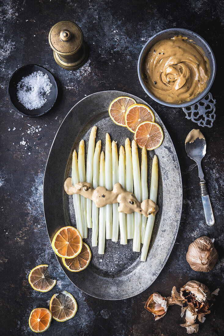 Steamed white asparagus with black garlic and truffle aioli